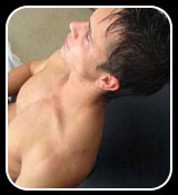 Sexy young Gareth gets sucked off through a hole in the wall!