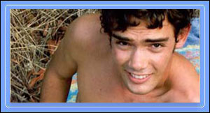 Justin loves to surf, and it shows in his rock-hard abs, wild wind-blown hair and tight little ass!